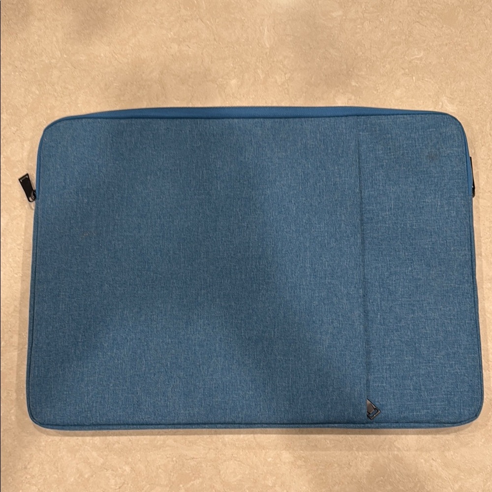 Blue Laptop Sleeve. Fits a 17 inch laptop and is padded on the inside.